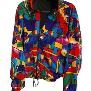 80s Tail brand multi colored windbreaker jacket.